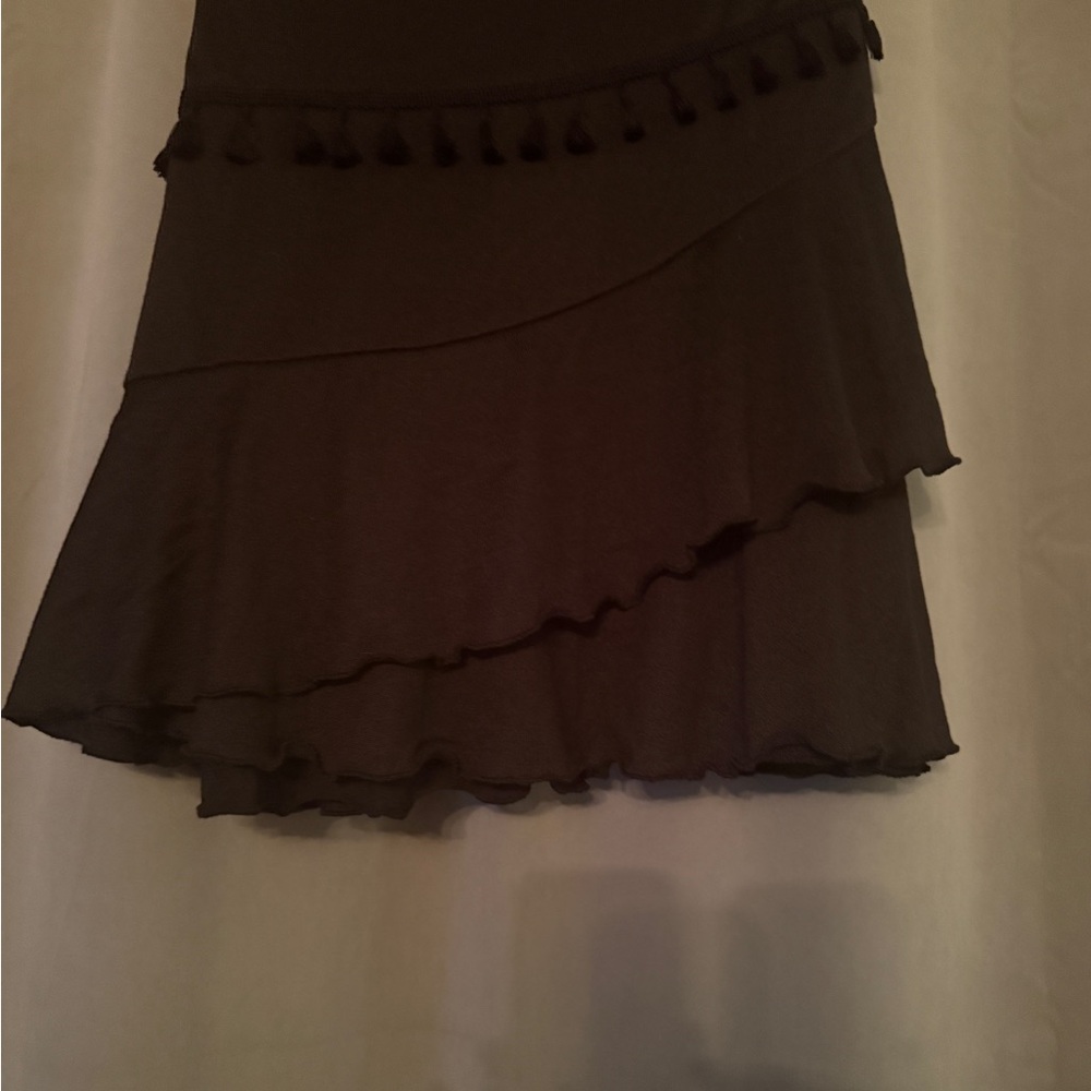 Elegant Black Asymmetrical Skirt with Tassel Detail
